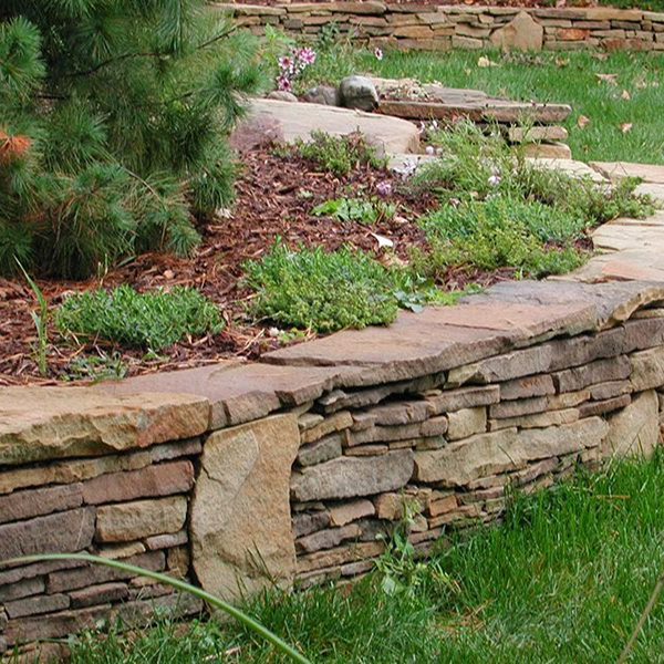 https://www.gillbroslandscapes.com/wp-content/uploads/2024/06/naturalretaingwalls-1.jpg