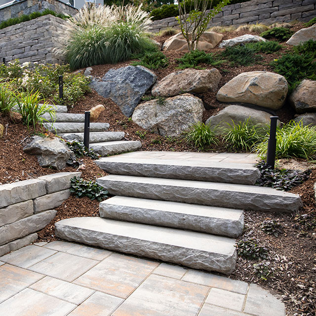 https://www.gillbroslandscapes.com/wp-content/uploads/2024/06/stairsandsteppingstones.jpg